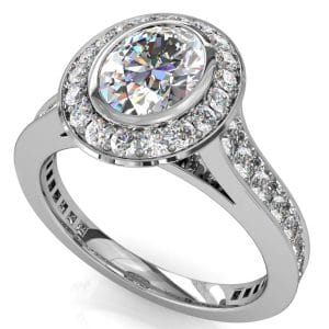 Oval Cut Diamond Engagement Ring, Bezel Set into a Bead Set Halo and Band, with Hidden Diamond Undersetting.