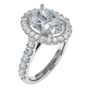 Oval Cut Diamond Engagement Ring, 4 Pear Shaped Claws set in a Cut Claw Halo and Band, with Hidden Diamond Undersetting.