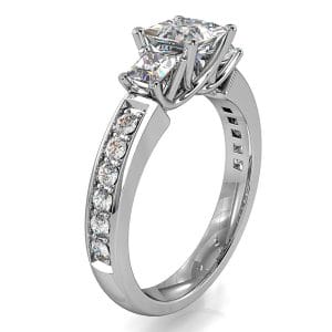 Princess Cut Trilogy Diamond Engagement Ring, on a Bead Set Band and an Undersweep Setting.
