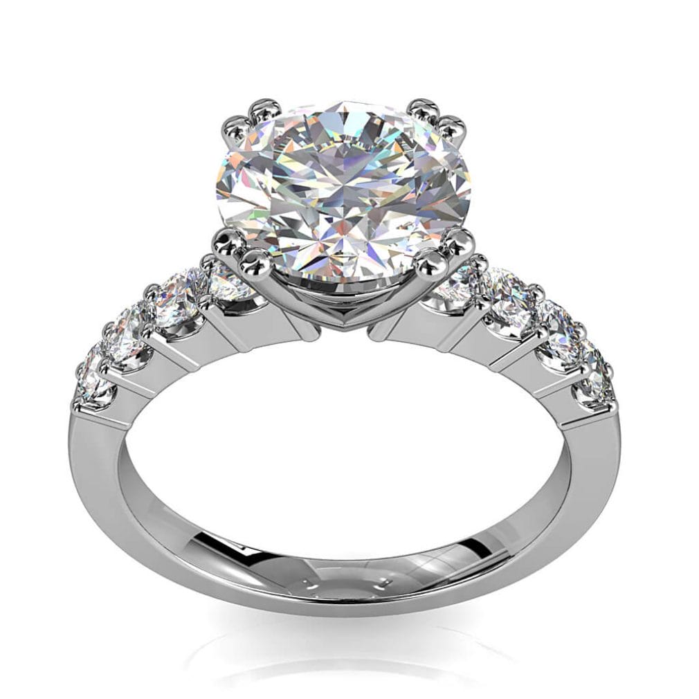 Round Brilliant Cut Solitaire Diamond Engagement Ring, 4 Double Claws Set on a Large Diamond Cut Claw Band with Classic Support Bar Undersetting.