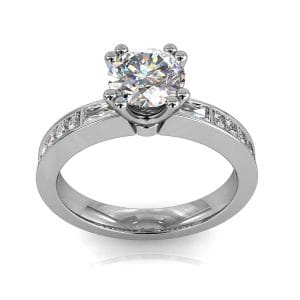 Round Brilliant Cut Solitaire Diamond Engagement Ring, 4 Double Claws Set with Baguette Side Stones on a Bead Set Band with Classic Undersetting.