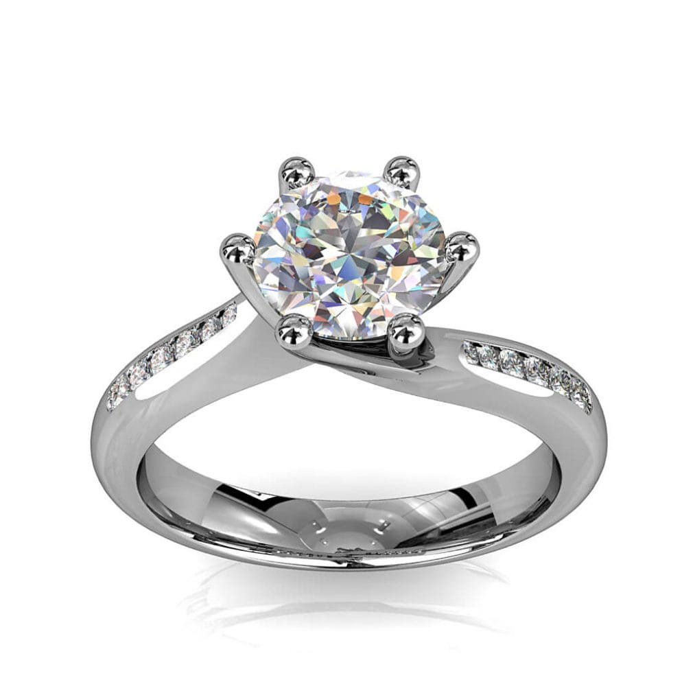 Round Brilliant Cut Solitaire Diamond Engagement Ring, 6 Offset Claws Set on Sweeping Channel Set Band with Twist Undersetting.