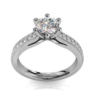 Round Brilliant Cut Solitaire Diamond Engagement Ring, 6 Button Claws Set on Straight Bead Set Band with Fountain Undersetting.