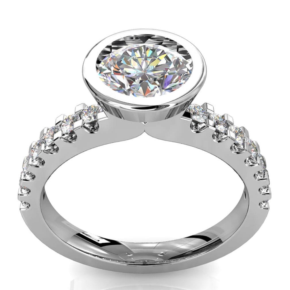 Round Brilliant Cut Diamond Solitaire Engagement Ring, Bezel Set on a Heavy Cut Claw Band.