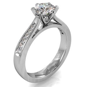 Round Brilliant Cut Solitaire Diamond Engagement Ring, 6 Button Claws Set on Tapered Bead Set Flat Band with Classic Underrail Setting.