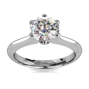 Round Brilliant Cut Solitaire Diamond Engagement Ring, 6 Button Claws Set on Tapered Knife Edge Rounded Band with Crown Undersetting.