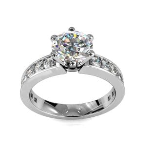 Round Brilliant Cut Solitaire Diamond Engagement Ring, 6 Button Claws Set on Straight Channel Set Band with Crown Undersetting.