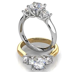 Round Brilliant Cut Diamond Trilogy Engagement Ring, Stones 4 Claw Set on a Rounded Band and an Open Undersweep Setting.