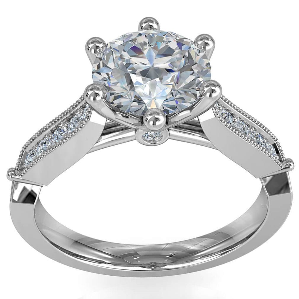 Round Brilliant Cut Solitaire Diamond Engagement Ring, 6 Button Claws Set on a Milgrain Bead Set Band with Art Deco Shaped Side Details and Hidden Diamond Undersetting.