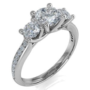 Round Brilliant Cut Diamond Trilogy Engagement Ring, Stones 4 Claw Set on a Thin Bead Set Band with an Undersweep Setting.