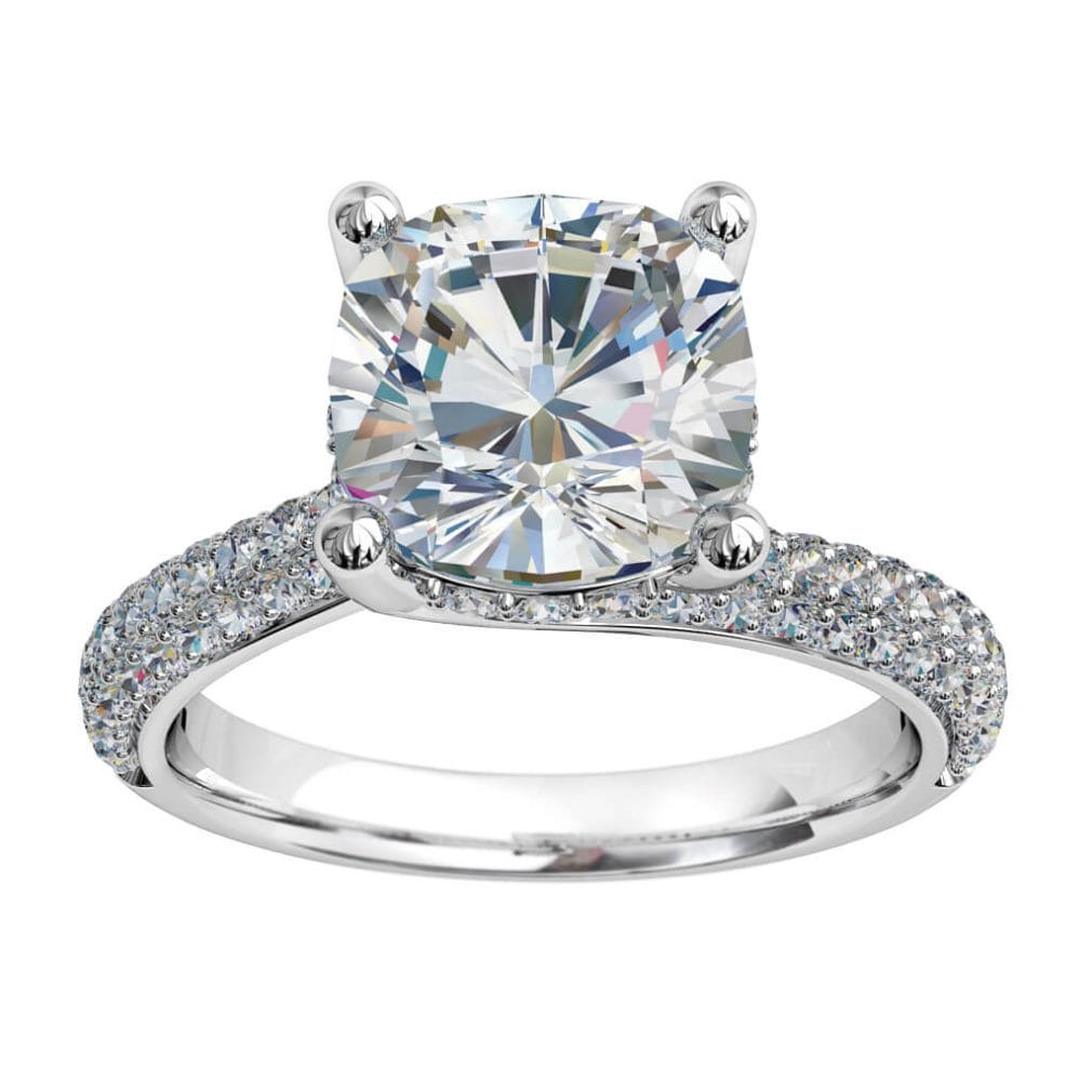 Round Brilliant Cut Solitaire Diamond Engagement Ring, 4 Button Claws Set on Fine Sweeping Rolled Pavé Band with Stone Set Underrail.