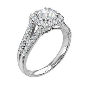 Round Brilliant Cut Diamond Halo Engagement Ring, 4 Double Claws Set in a Cushion Shape Cut Claw Halo on a Split Cut Claw Band.