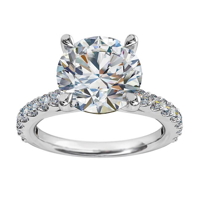 Round Brilliant Cut Solitaire Diamond Engagement Ring, 4 Pear Shaped Claws Set on a Tapered Cut Claw Band with Fountain Undersetting.